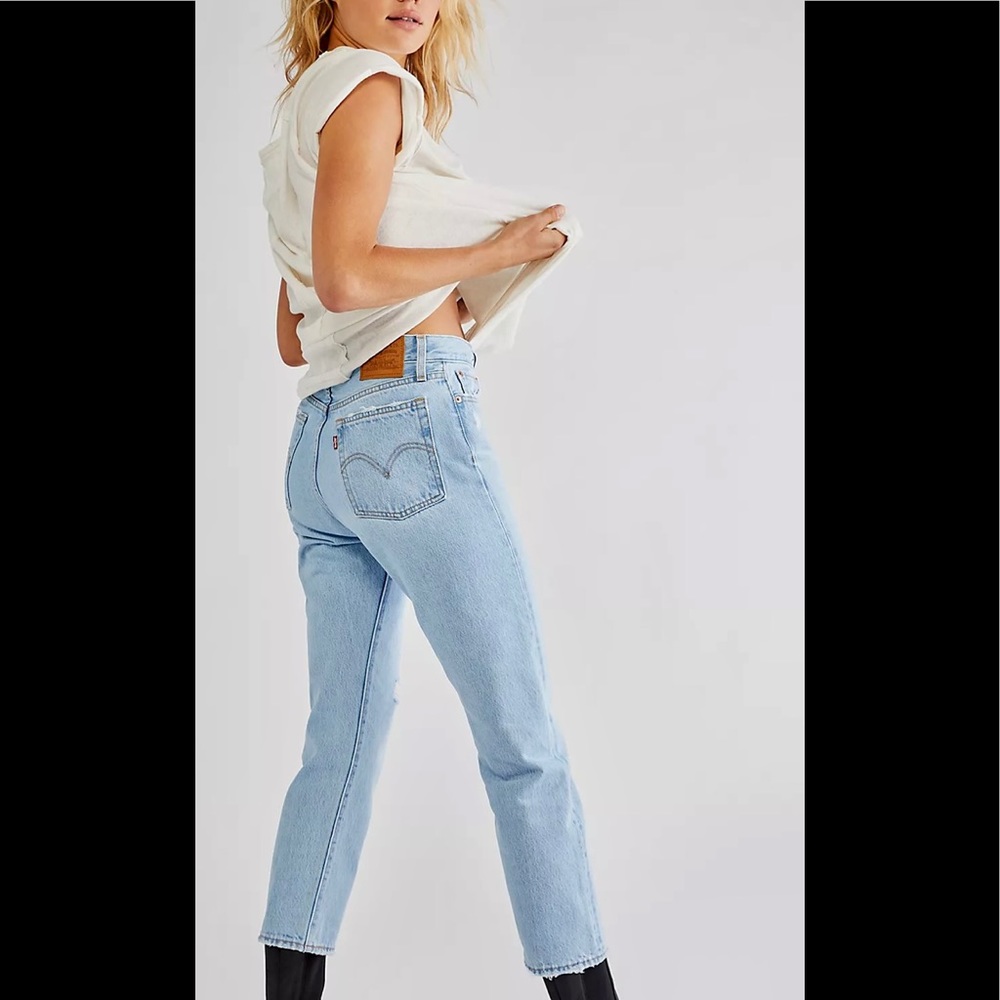 Levi wedgie straight jeans with holes.